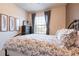 Bright bedroom with a queen-size bed and neutral decor at 9047 Rhodes St, Kissimmee, FL 34747