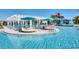 Expansive pool with a water play area for and plenty of seating at 9047 Rhodes St, Kissimmee, FL 34747