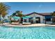 Community pool with bar and lounge area at 9047 Rhodes St, Kissimmee, FL 34747