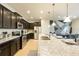 Modern kitchen with granite countertops and stainless steel appliances at 9047 Rhodes St, Kissimmee, FL 34747