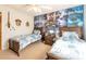 Harry Potter themed bedroom with twin beds and book mural at 9047 Rhodes St, Kissimmee, FL 34747