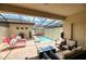 Private screened pool and patio furniture at 9047 Rhodes St, Kissimmee, FL 34747