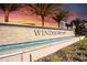 Community entrance water feature with Windsor at Westside sign at 9047 Rhodes St, Kissimmee, FL 34747