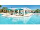 Expansive resort-style pool with shaded seating and lounge areas at 9047 Rhodes St, Kissimmee, FL 34747