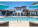 Resort-style pool with lounge chairs and clubhouse view at 9047 Rhodes St, Kissimmee, FL 34747