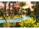Enjoyable lazy river winding through lush landscaping at 9047 Rhodes St, Kissimmee, FL 34747