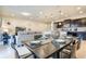 Elegant dining room with a dark wood table and four chairs at 9047 Rhodes St, Kissimmee, FL 34747