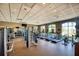Well-equipped fitness center with treadmills, weight machines, and ample space at 9047 Rhodes St, Kissimmee, FL 34747