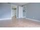 Bright bedroom with tile flooring and access to bathroom at 2217 Grand Cayman Ct # 1233, Kissimmee, FL 34741