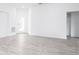 Living room with door to outside at 48 Atlantic Ave, Babson Park, FL 33827