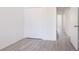 Spacious bedroom with ample closet space and vinyl flooring at 48 Atlantic Ave, Babson Park, FL 33827