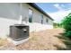 House exterior showcasing the new AC unit at 48 Atlantic Ave, Babson Park, FL 33827