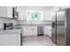 Modern kitchen with stainless steel appliances at 48 Atlantic Ave, Babson Park, FL 33827