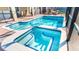 Inviting pool and spa area with ample seating at 1495 Rolling Fairways Dr, Davenport, FL 33896