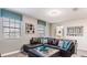 Recreation room with sectional sofa and large windows at 1495 Rolling Fairways Dr, Davenport, FL 33896