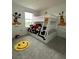 Mickey Mouse themed bedroom with a bunk bed and cheerful decor at 718 Longboat Dr, Davenport, FL 33896