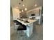 Modern kitchen with gray cabinets and stainless steel appliances at 718 Longboat Dr, Davenport, FL 33896