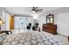 Main bedroom with pool view and access, walk-in closet and dresser at 1500 8Th Se St, Winter Haven, FL 33880