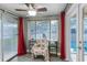 Relaxing sunroom with comfy seating and pool view at 1500 8Th Se St, Winter Haven, FL 33880