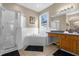 Primary bathroom with a tub, shower and double vanity at 476 Calabay Parc Blvd, Davenport, FL 33897