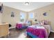 Bedroom with twin beds and Frozen theme at 476 Calabay Parc Blvd, Davenport, FL 33897