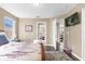 Comfortable bedroom with ensuite bathroom access at 476 Calabay Parc Blvd, Davenport, FL 33897