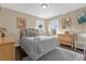 Cozy bedroom with a comfortable bed and plenty of storage at 476 Calabay Parc Blvd, Davenport, FL 33897