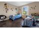bedroom with twin beds and Toy Story decor at 476 Calabay Parc Blvd, Davenport, FL 33897