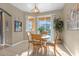 Bright breakfast nook features a table and chairs, providing a casual dining area at 476 Calabay Parc Blvd, Davenport, FL 33897