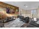 Fun game room featuring a large TV, beanbag chairs, and a wood wall at 476 Calabay Parc Blvd, Davenport, FL 33897