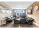 Game room with arcade games, beanbag chairs, and large screen TV at 476 Calabay Parc Blvd, Davenport, FL 33897