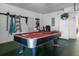 Finished garage with pool table and storage at 476 Calabay Parc Blvd, Davenport, FL 33897