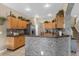 Kitchen with an island and a view of dining area at 476 Calabay Parc Blvd, Davenport, FL 33897