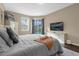 Bright bedroom with pool access and a king-size bed at 476 Calabay Parc Blvd, Davenport, FL 33897
