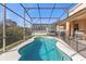 Private screened-in pool with a spacious deck at 476 Calabay Parc Blvd, Davenport, FL 33897