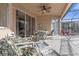 Relaxing screened-in patio with pool access at 476 Calabay Parc Blvd, Davenport, FL 33897