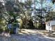 Partially fenced backyard with shed and trees at 6790 Bass Hwy, St Cloud, FL 34771