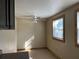 Cozy dining area with a ceiling fan and large window at 6790 Bass Hwy, St Cloud, FL 34771