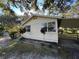Side view of the house with a carport at 6790 Bass Hwy, Saint Cloud, FL 34771