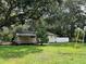 Cozy one-story home with a covered porch at 6790 Bass Hwy, St Cloud, FL 34771
