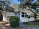 Quaint one-story home with a satellite dish at 6790 Bass Hwy, St Cloud, FL 34771