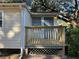 House exterior detail, showcasing a side deck and door at 6790 Bass Hwy, St Cloud, FL 34771