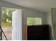 Laundry room with exterior access and shelving at 6790 Bass Hwy, St Cloud, FL 34771
