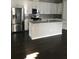 Modern kitchen with stainless steel appliances and island at 15231 Honeybell Dr, Winter Garden, FL 34787