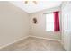 Simple bedroom with ceiling fan and tiled floors at 905 Knollwood Dr, Davenport, FL 33837