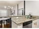 Kitchen with granite countertops, stainless steel dishwasher and sink at 8968 Silver Pl, Kissimmee, FL 34747
