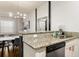 Kitchen with granite countertops, stainless steel dishwasher and sink at 8968 Silver Pl, Kissimmee, FL 34747