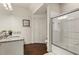 Modern bathroom with granite countertops, double sinks, and a shower/tub combo at 8968 Silver Pl, Kissimmee, FL 34747