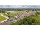 Aerial view of townhouses and surrounding landscape at 8968 Silver Pl, Kissimmee, FL 34747