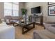 Relaxing common area with TV and comfortable seating at 8968 Silver Pl, Kissimmee, FL 34747